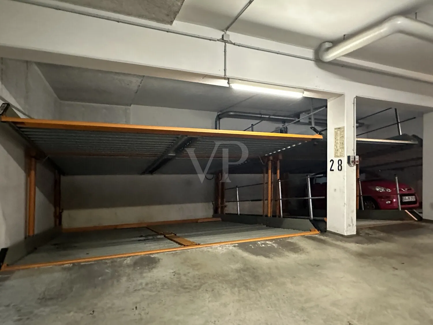 Zugehöriger Tiefgaragenstellplatz