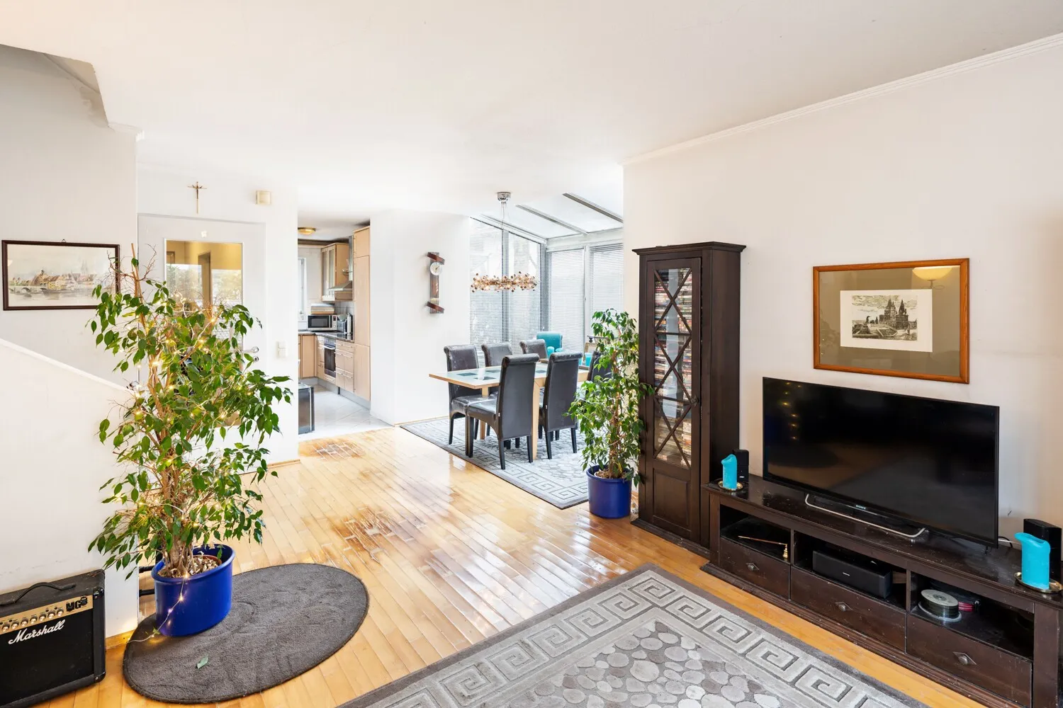 Wohnzimmer mit Wintergarten