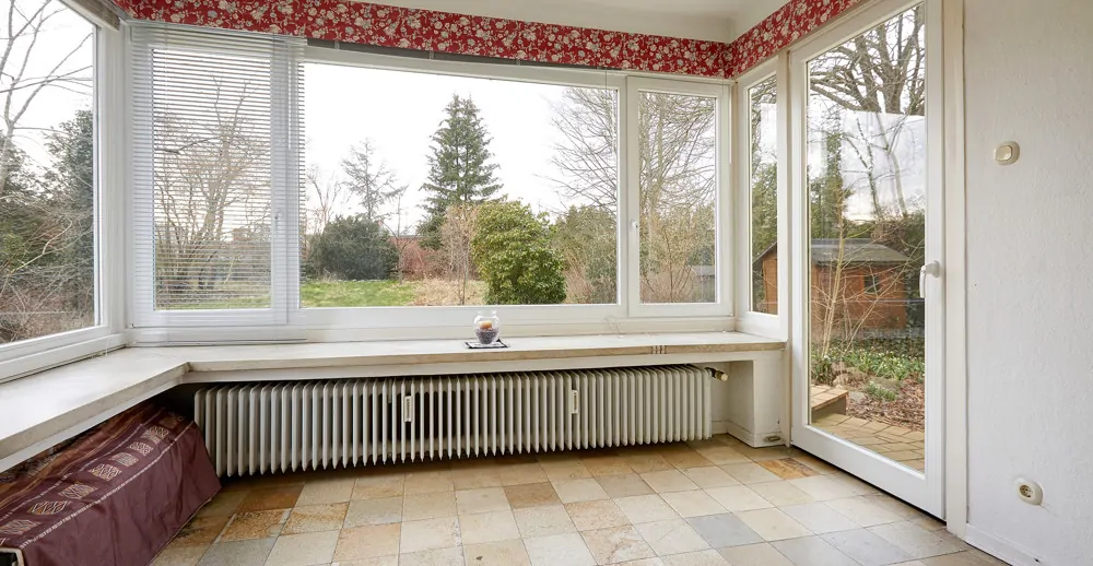 Wintergarten mit Zugang zum Garten