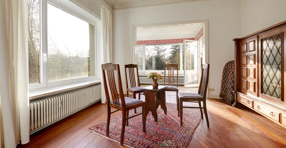 Zimmer mit anschließendem Wintergarten