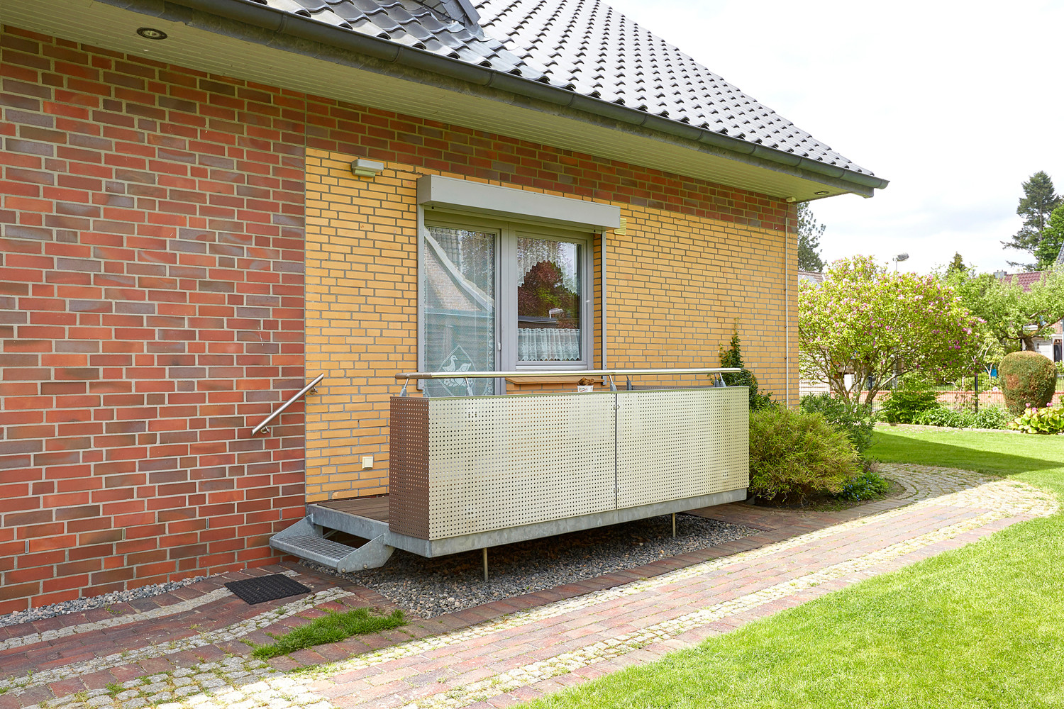 Küchenbalkon mit Gartenzugang