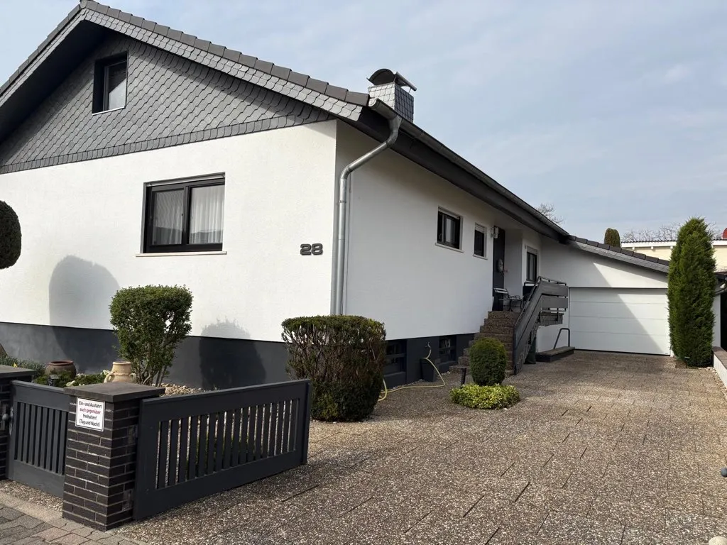 Familienglück mit Wintergarten und lichtdurchfluteten Wohnräumen entdecken
