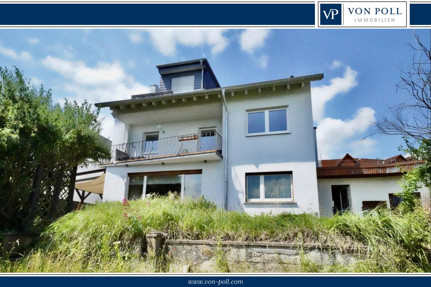 Zweifamilienhaus mit großem Garten in Ober-Rosbach