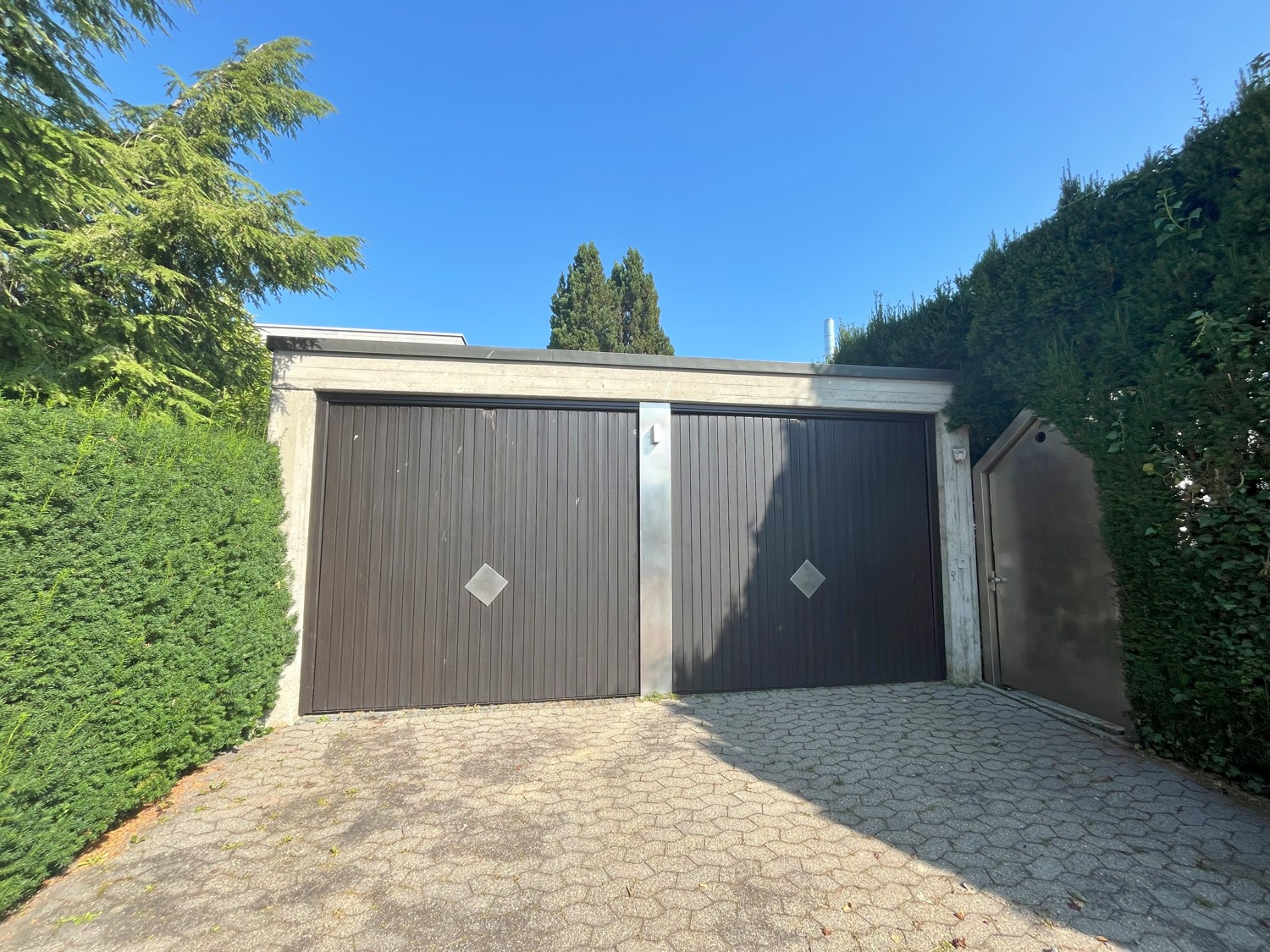 Luxuriöses Einfamilienhaus mit Einliegerwohnung und idyllischem Garten