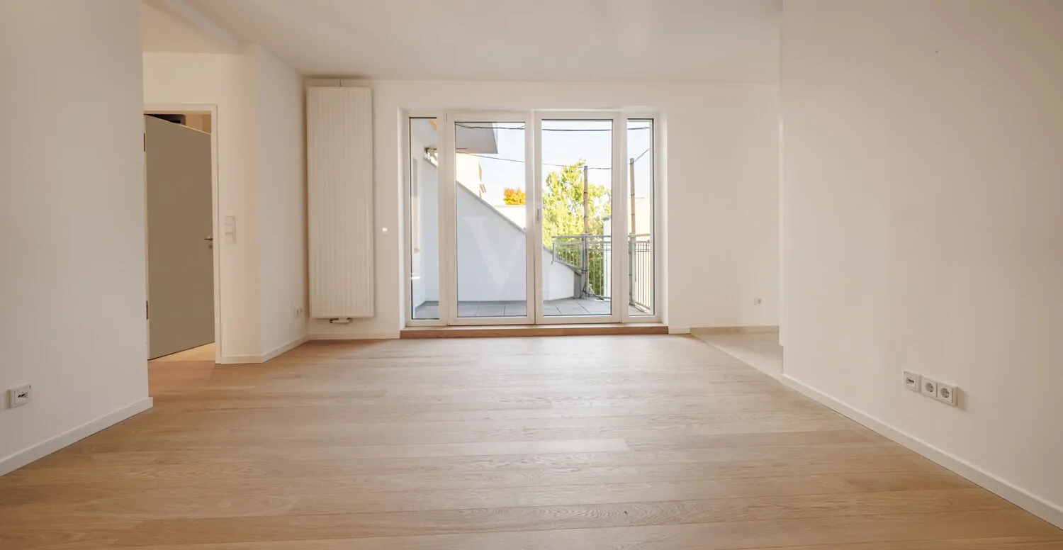 Wohnzimmer mit Zugang zur Südostterrasse