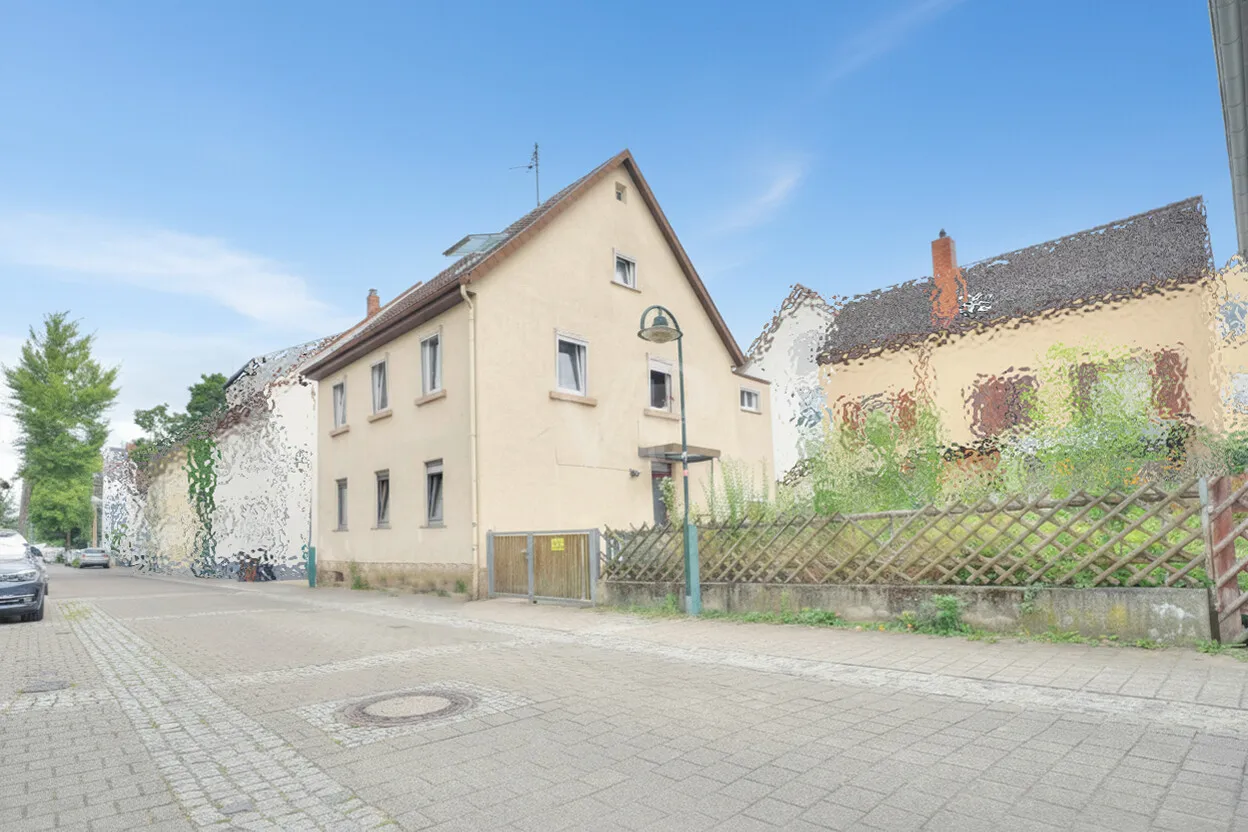 Vermietetes Zweifamilienhaus mit Dachgeschoss und kleinem Garten