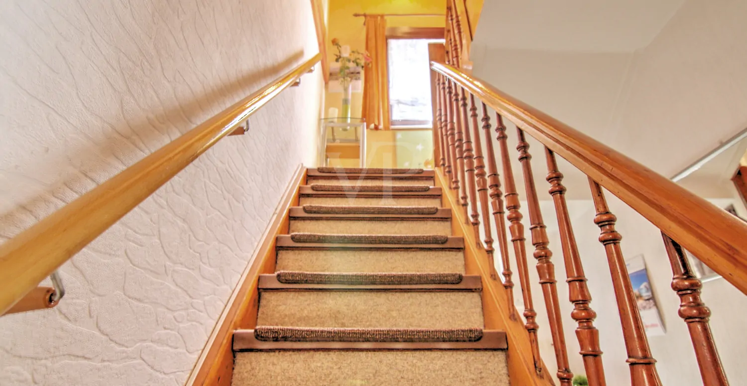 Treppe in das Obergeschoss