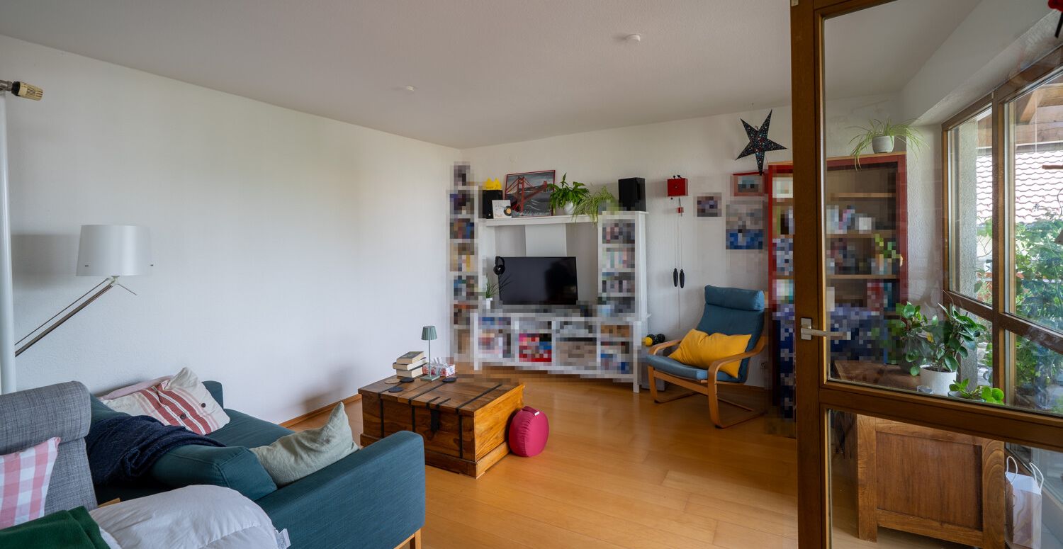 OG - Wohnzimmer mit Balkonzugang