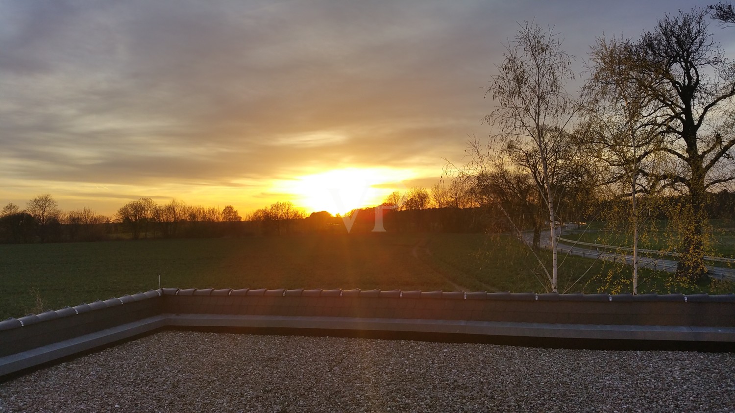 Ausblick Sonnenuntergang von der Dachterrasse