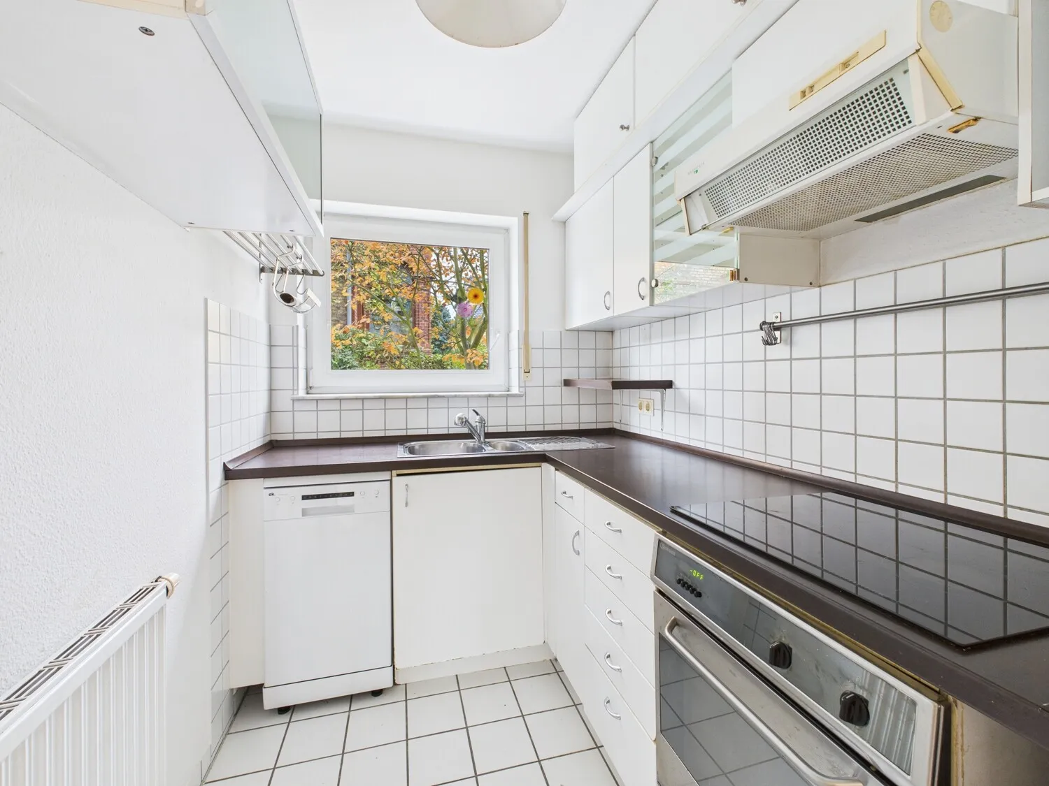 Well-maintained maisonette apartment with garden and parking space in a quiet location!