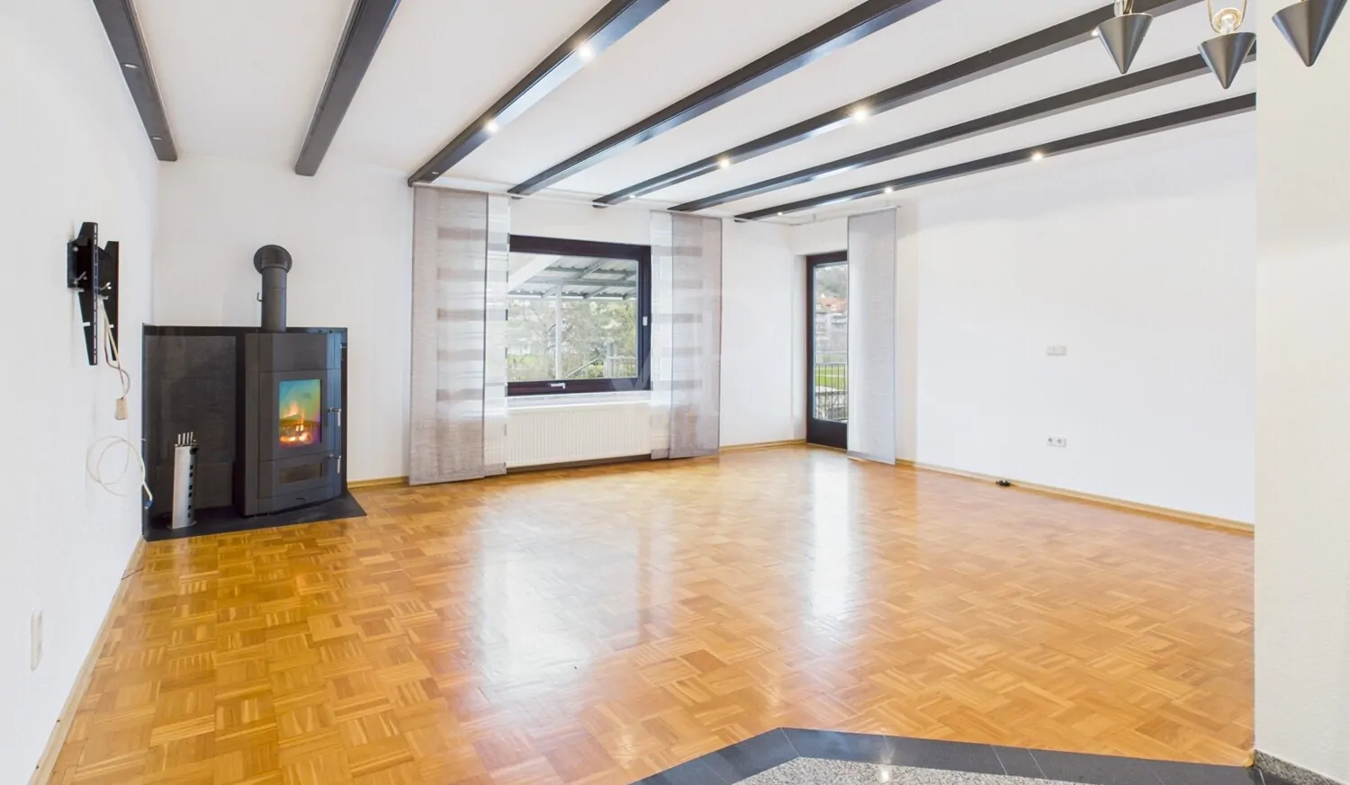 Wohn-/Essbereich mit Holzofen