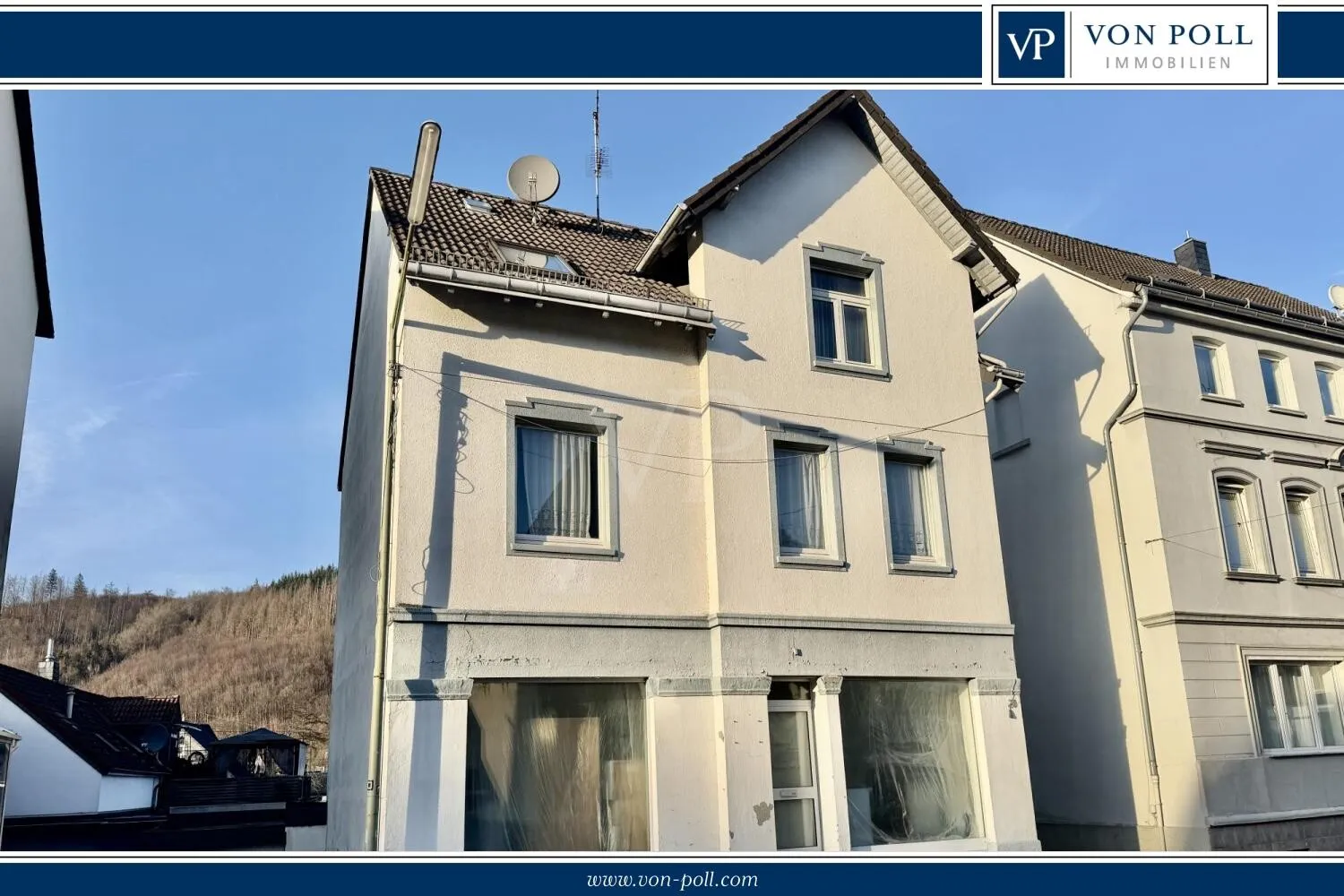 Zweifamilienhaus mit Geschäftslokal