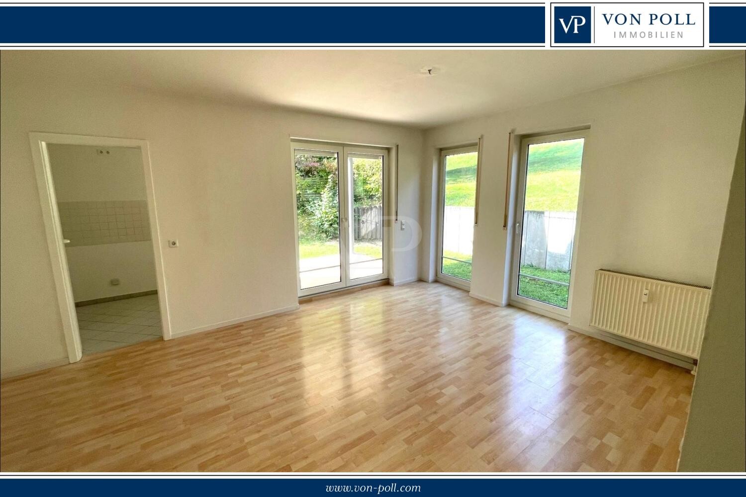 Charmante 2 Zi - Wohnung mit überdachter Terrasse, Gartenanteil und guter Anbindung