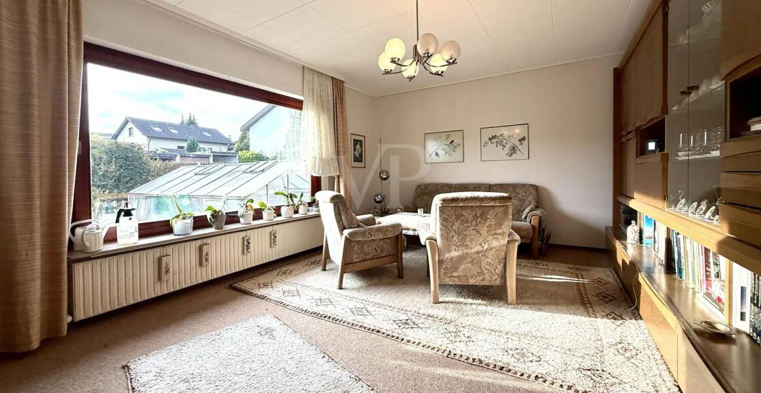 Einfamilienhaus auf attraktivem Grundstück in zentraler Lage