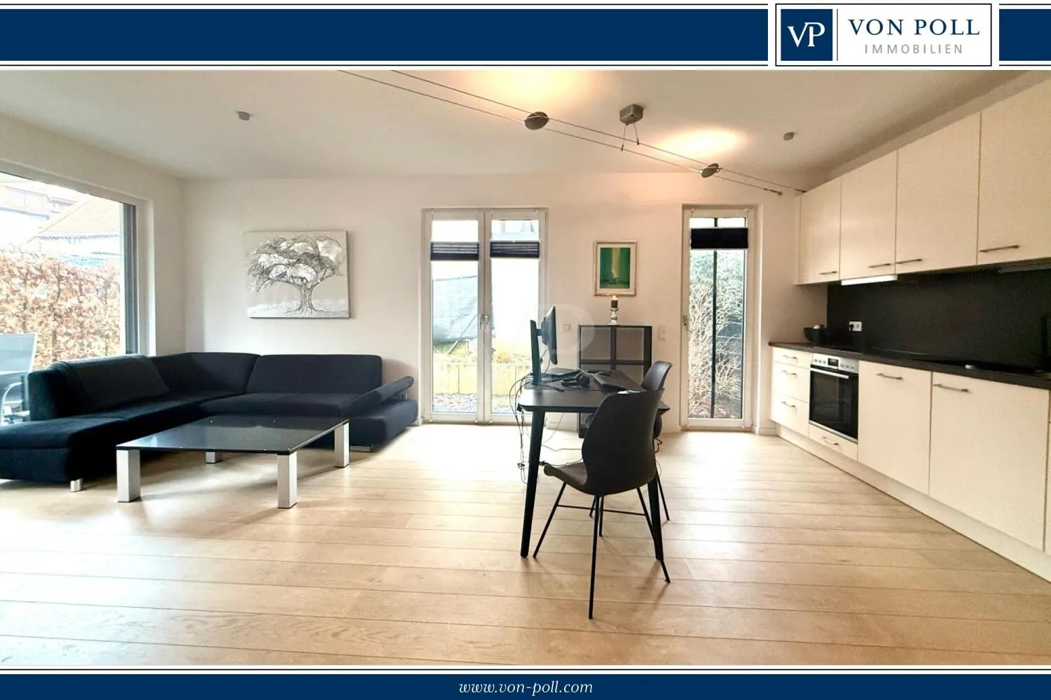 Hochwertige Gartenwohnung mit Westterrasse und Garage