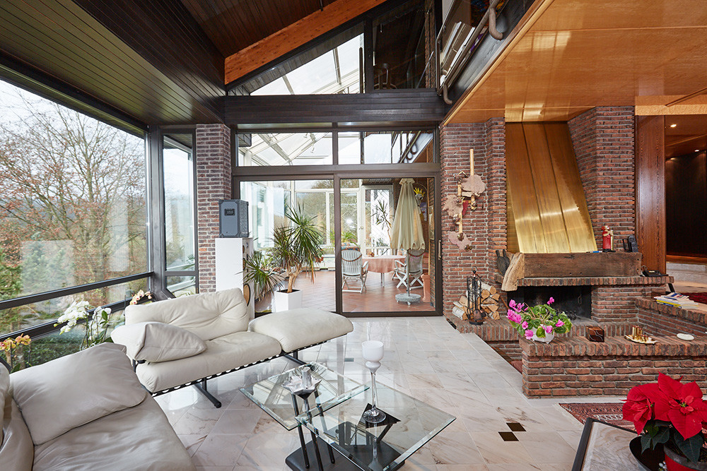 Wohnzimmer - Blick in den Wintergarten
