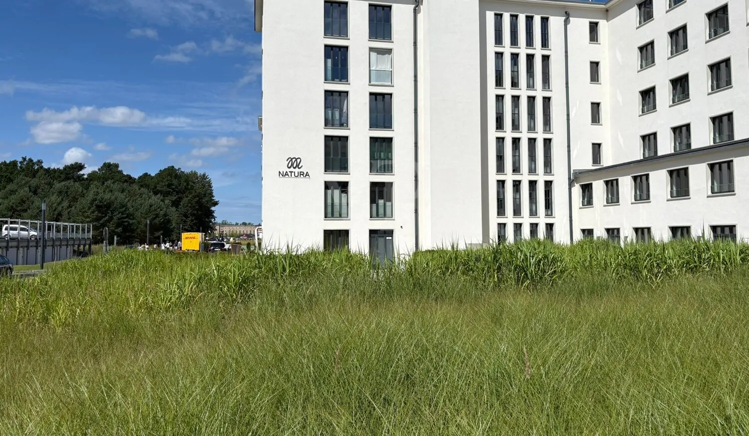 **Moderne Eigentumswohnung mit großem Balkon, Meerblick und Komfortausstattung in Haus 4 Natura – Südstrand 206**