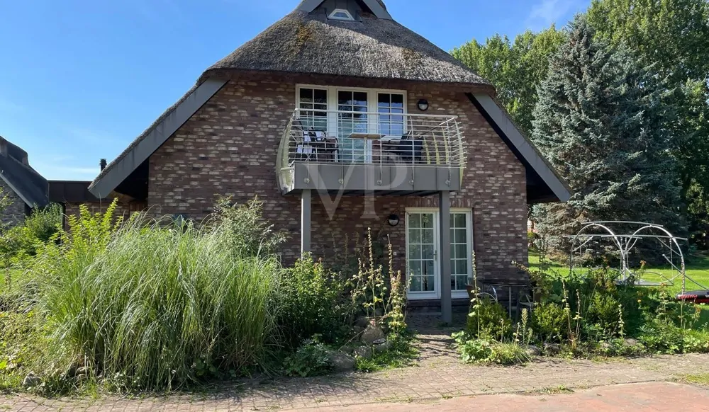 Ferienhaus in Neuensien mit 4 Wohnungen: Komfortable Ausstattung  und Seeblick