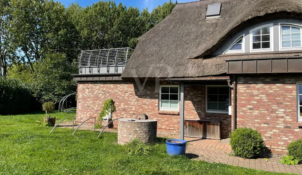 Ferienhaus in Neuensien mit 4 Wohnungen: Komfortable Ausstattung  und Seeblick