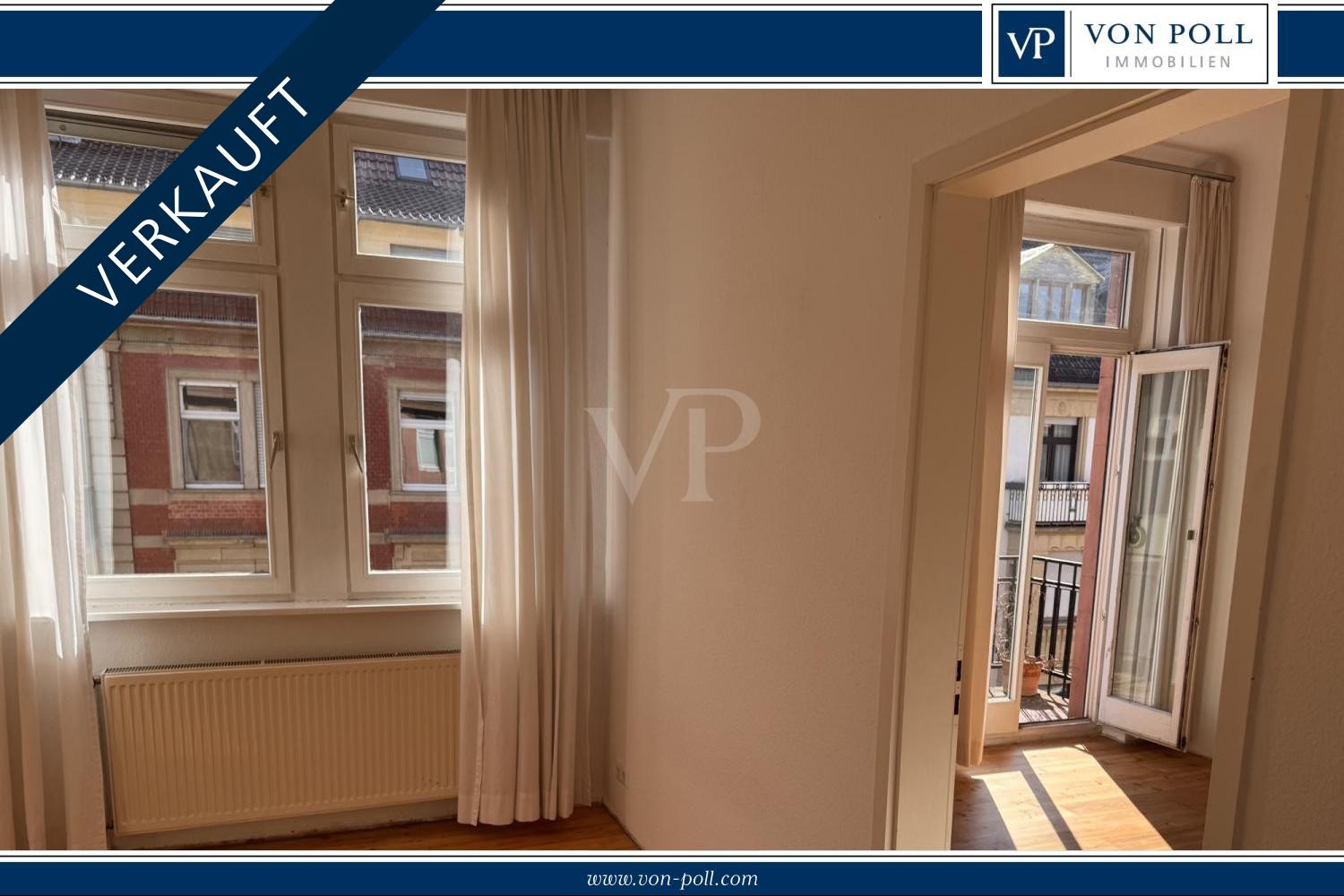Lichtdurchflutete Wohnung mit zwei Balkonen in zentraler Lage.