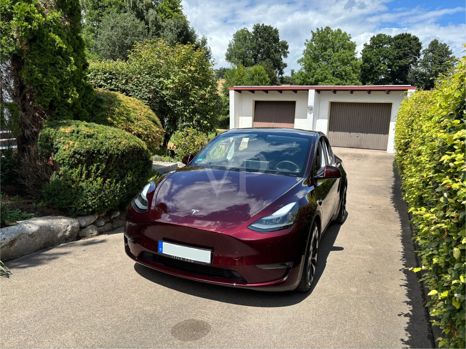 Besonderes Wohnjuwel in Hanglage mit traumhaftem Ausblick inkl. Elektroauto