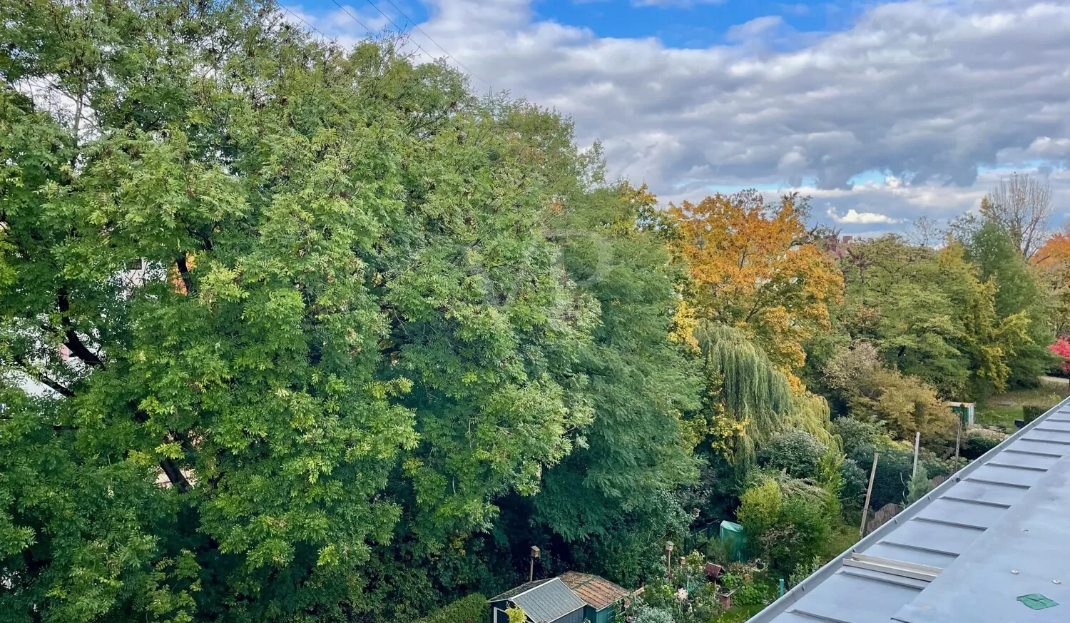 Lichtdurchflutete Maisonette mit Wintergarten und großzügiger Dachterrasse