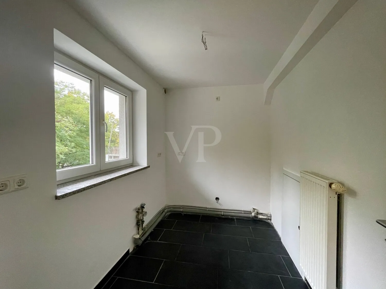 Lichtdurchflutete Maisonette mit Wintergarten und großzügiger Dachterrasse