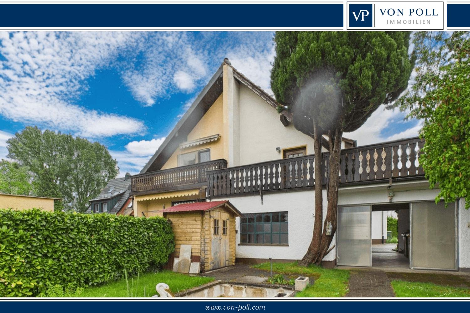 Viel Platz für die Familie – Doppelhaushälfte mit Einliegerwohnung, Dachterrasse und Traumgarten