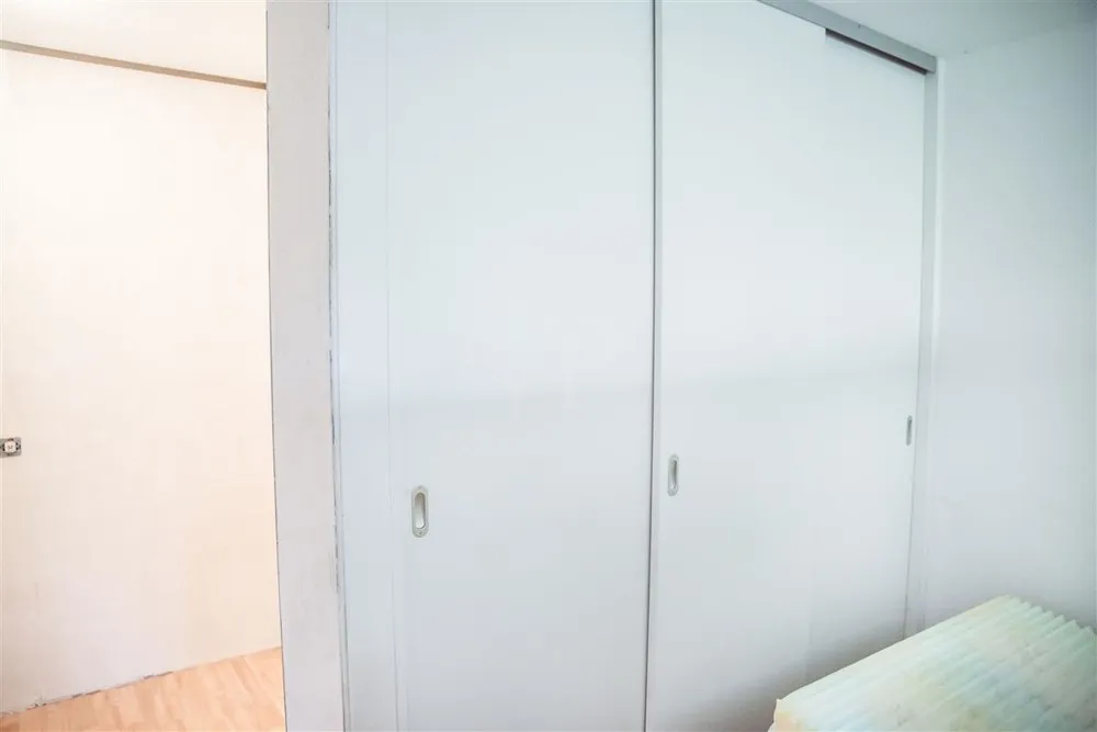 Schlafbereich mit integriertem Kleiderschrank