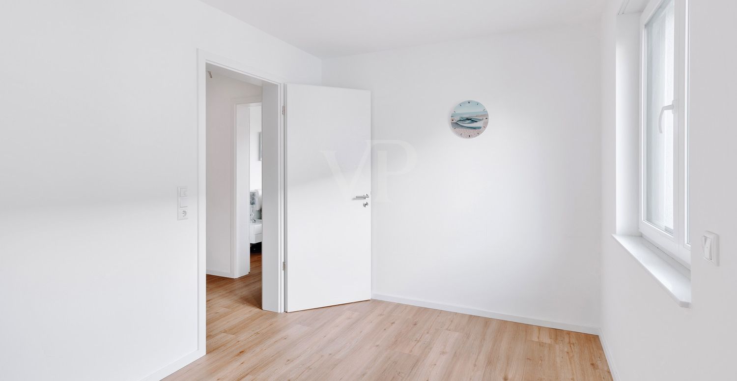 Stilvolle Doppelhaushälfte mit hochwertiger Ausstattung und energieeffizientem Wohnkomfort