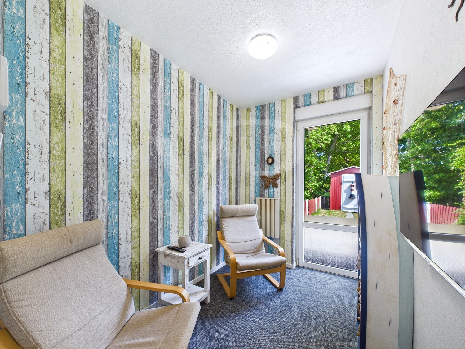 Lesezimmer mit Terrassenzugang
