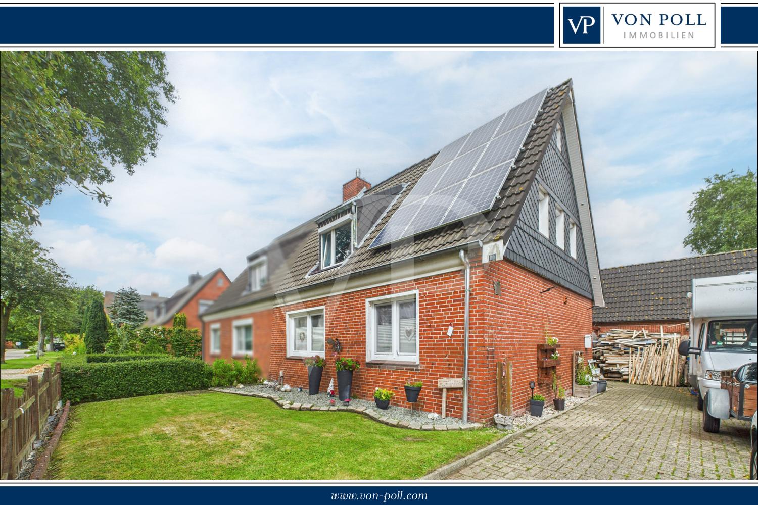 Wohnen in Bestlage: Doppelhaushälfte mit moderner Küche, Photovoltaik und Garten