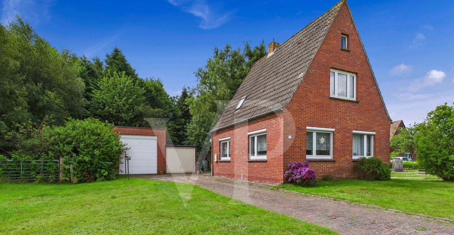 Familienleben gestalten: Großzügiges Haus mit individuellem Entwicklungspotenzial in Großheide