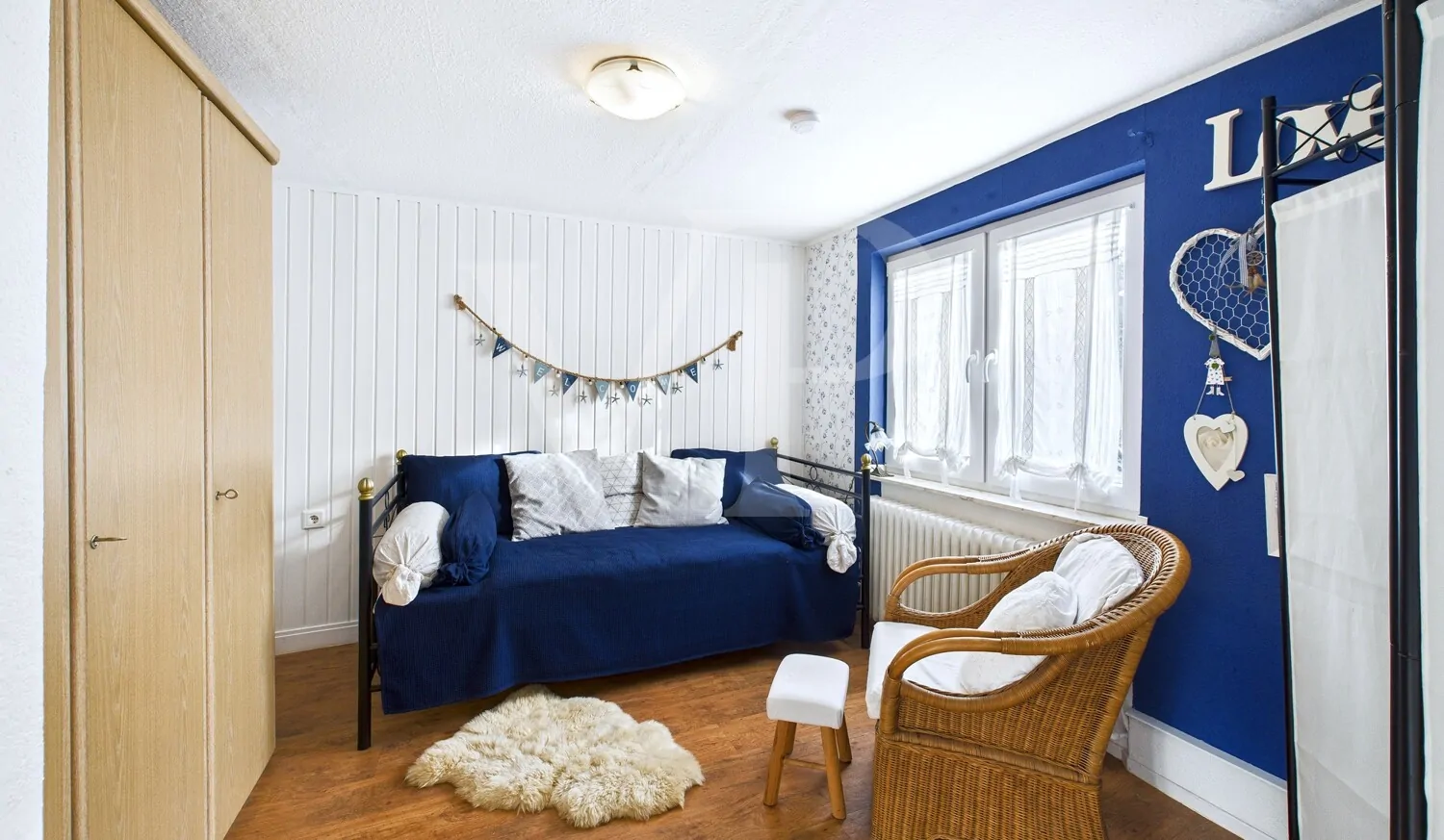 Wohn- / Schlafzimmer Einliegerwohnung 1